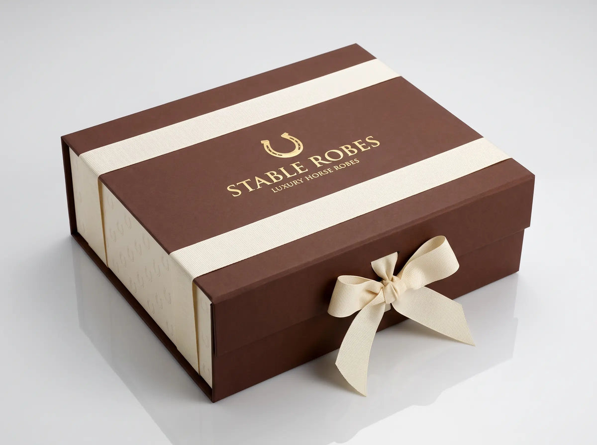 Stable Robes closed chestnut gift box with gold horseshoe